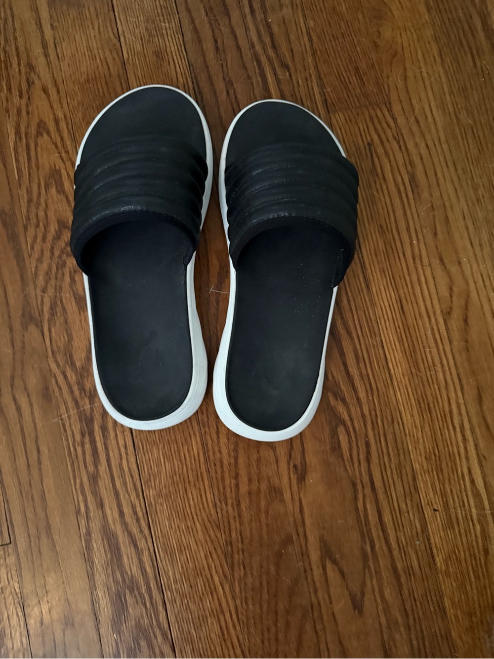 OluKai Black Slide Sandals with White Sole